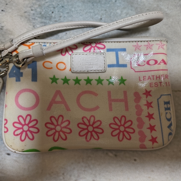 Coach Handbags - Coach Floral Print Wristlet with Pink and Blue Accents